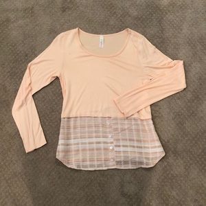 Peach colored long sleeve shirt